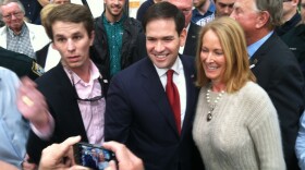 Sen. Marco Rubio poses with supporters after the event