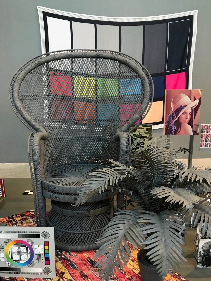 A detail from "Neutral Calibration Studies (Ornament [plus] Crime)," including a rattan peacock chair of the sort seen in a 1967 photo of Huey P. Newton. [9/13/19]