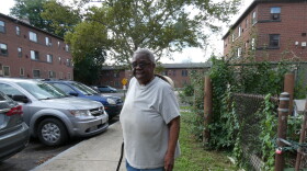 Mable Wilson, a 76 year old resident of the Pioneer Homes public housing complex in Syracuse, uses a cane to balance herself as a result of her hearing issues. The issue could be resolved with hearing aids, which she has gone years without.