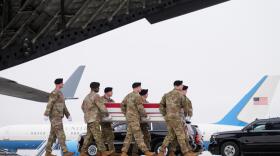 An Army carry team moves a flag-draped transfer case with the remains of U.S. Army Reserve soldier Chief Warrant Officer 3 Robert Marzan, 54, of Sacramento, Calif., who was killed in a drone strike at a command center in Kuwait after the U.S. and Israel launched its military campaign against Iran, during a casualty return, Saturday, March 7, 2026, at Dover Air Force Base, Del. (Mark Schiefelbein/AP)