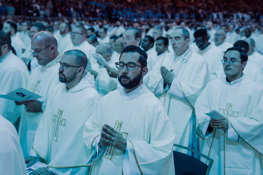 Catholic clergy pray during the beatification Mass for the late Archbishop Fulton J. Sheen on Thursday.