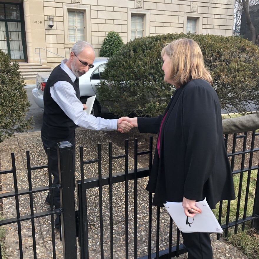 Clergy abuse survivor Becky Ianni (right) delivers a letter to the Vatican Embassy in Washington, D.C., addressed to Pope Francis.