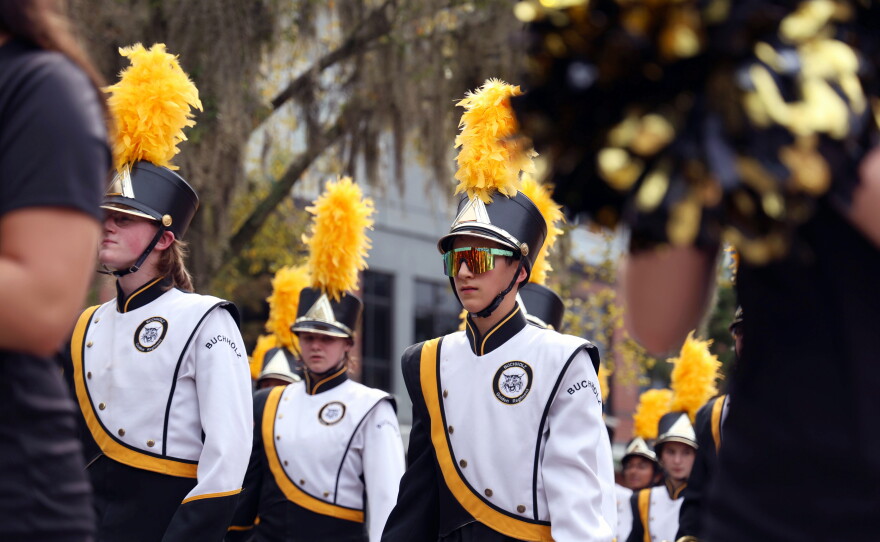 The Buchholz High School marching band marches during the University of Florida Homecoming parade in Gainesville Friday, Oct. 9, 2026. (Alessia Lavayen/WUFT News)