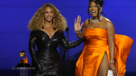 Beyonce, left, and Megan Thee Stallion accept the award for best rap song for "Savage" at the 63rd annual Grammy Awards at the Los Angeles Convention Center on Sunday, March 14, 2021. (Chris Pizzello/AP)