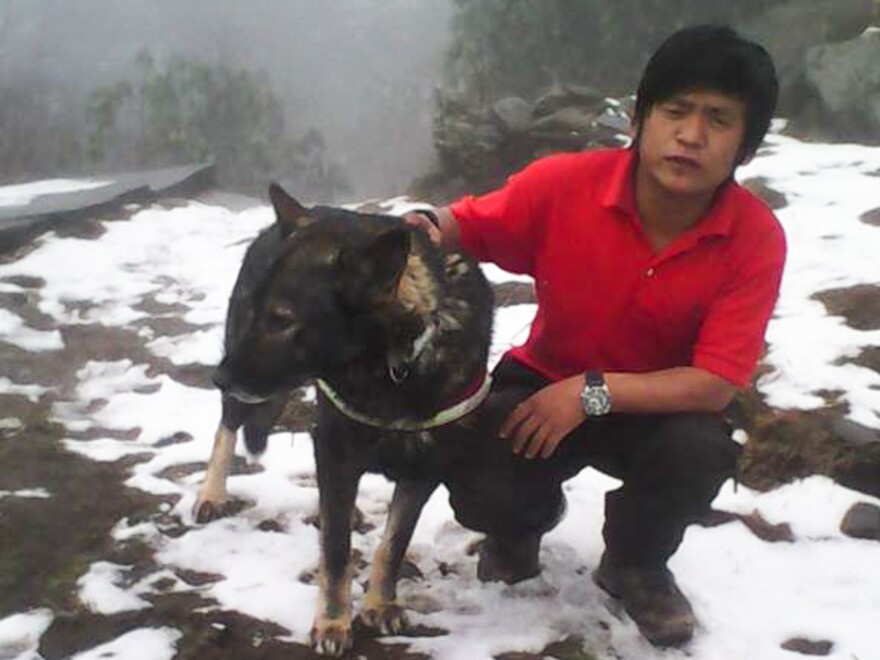 Karna Dura, of SAR Dogs Nepal, is leading the search for Dennis Lee Thian Poh. The team has about 10 men with four dogs.
