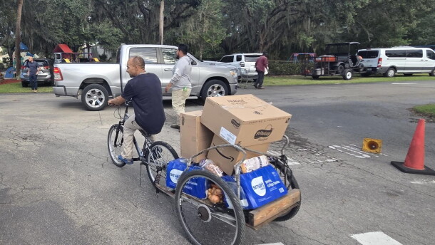 A evening food distribution in Immokalee recently let those who might not be able to attend a daytime event get access to needed food staples and supplies.