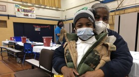 Cassandra Sherrill Patterson took her grandson, 6-year-old King, to get his second vaccine shot at Hopkins-Lloyd Community School.
