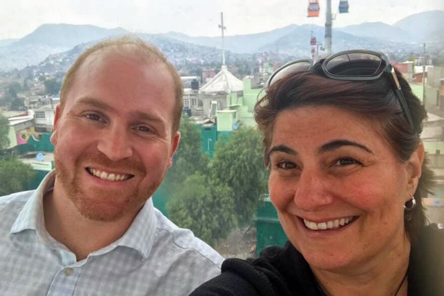 Here & Now's Jeremy Hobson on the aerial tram in Ecatepec, with NPR's Carrie Kahn. (Courtesy Carrie Kahn)