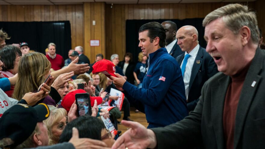 Donald Trump Jr. and Rick Saccone, GOP nominee for Pennsylvania's 18th district, shake hands with supporters during a campaign rally on Monday.