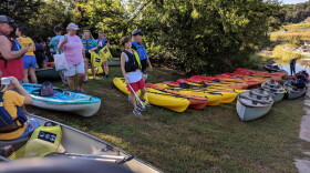 Volunteers prepare to take to the lake during the shoreline cleanup.