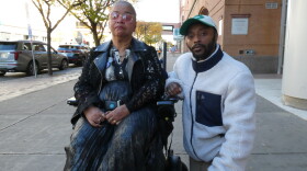 Agnes McCray and her son Charles Hudson pose for a photo on South Salina Street in Syracuse. Medicaid's home care support has been essential for McCray, who has cerebral palsy and worries for the program's future.