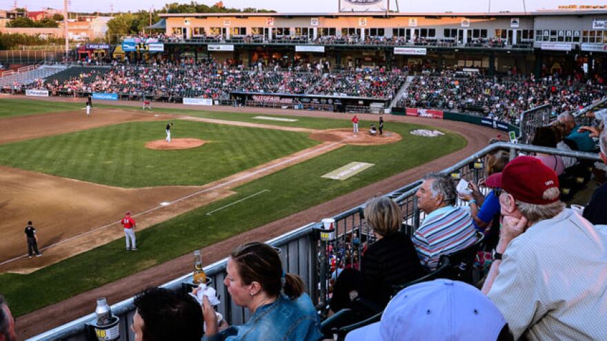 Spectators watch a Fisher Cats game from the stadium's upper deck.