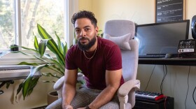 Realtor Zaurice Stephens in his home office and studio. Stephens uses his talents as a DJ to bring community together in Wooster.