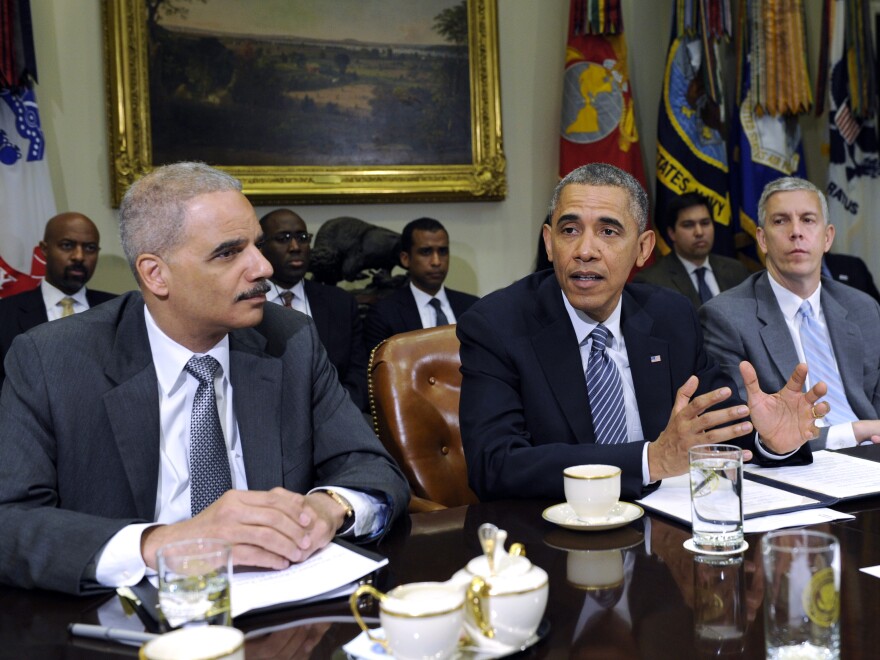 President Obama, with Attorney General Eric Holder and Housing and Urban Development Secretary Shaun Donovan, speaks about a report from My Brother's Keeper, an initiative to expand opportunities for young men and boys of color.