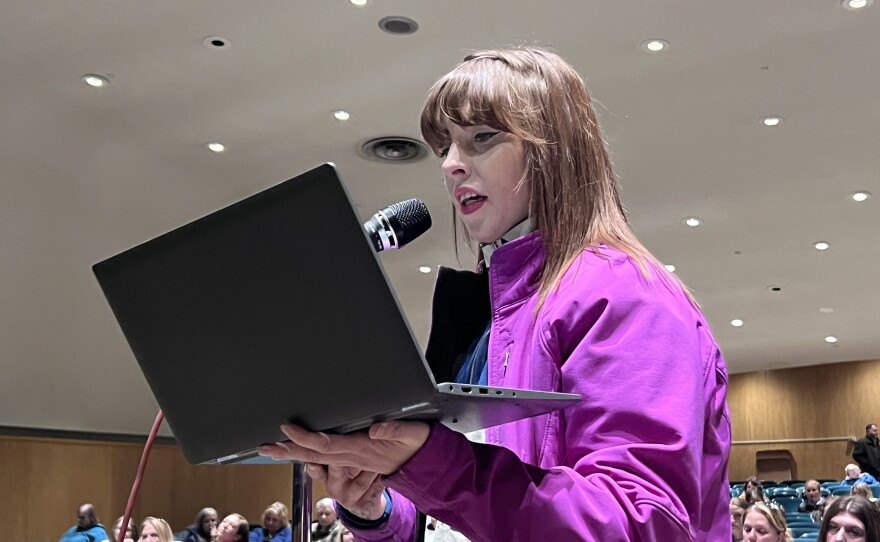 Morgan Martin continues twin sister Ashton Martin's written statement about the closure of Greenhaven Elementary School during the March 26, 2026, public hearing at Lincoln Middle School in Hibbing.