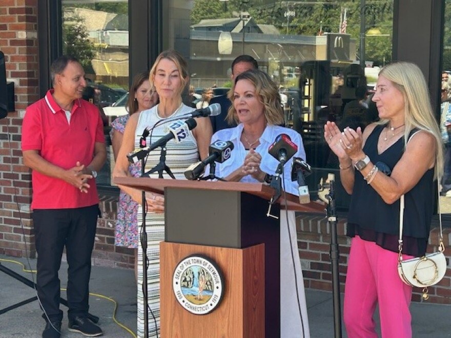 Nicole Klarides-Ditra, a Republican state representative serving Seymour, speaks at the reopening ceremony of the 67 Family Diner at the Klarides Village shopping plaza in Seymour, which she runs with her sister Themis Klarides, a former state House Republican Minority leader (on her right), and her cousin Karin Klarides Marinaro (on her left). Mike and Linda Abe, owners of the 67 Family Diner are in the background.