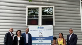 Left to right: - Dana Miller, Director of Business Development, Habitat’s Ethel Dube, ESL’s Foundation Director Ajamu Ktwana, Shanna Campell & her kids, ESL CEO Faheem Massod