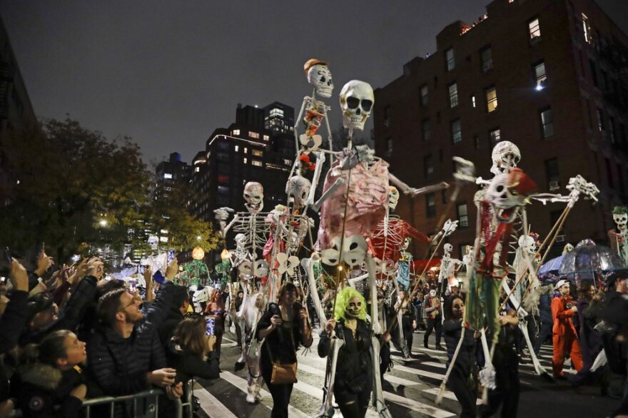 Revelers march during the Greenwich Village Halloween Parade in New York on Oct. 31, 2019. 