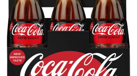 This photo provided by Coca-Cola shows a six-pack of bottled Coca-Cola Zero Sugar. Coke Zero is getting a makeover as Coke Zero Sugar in the United States. (Rodger Macuch/Courtesy of Coca-Cola via AP)