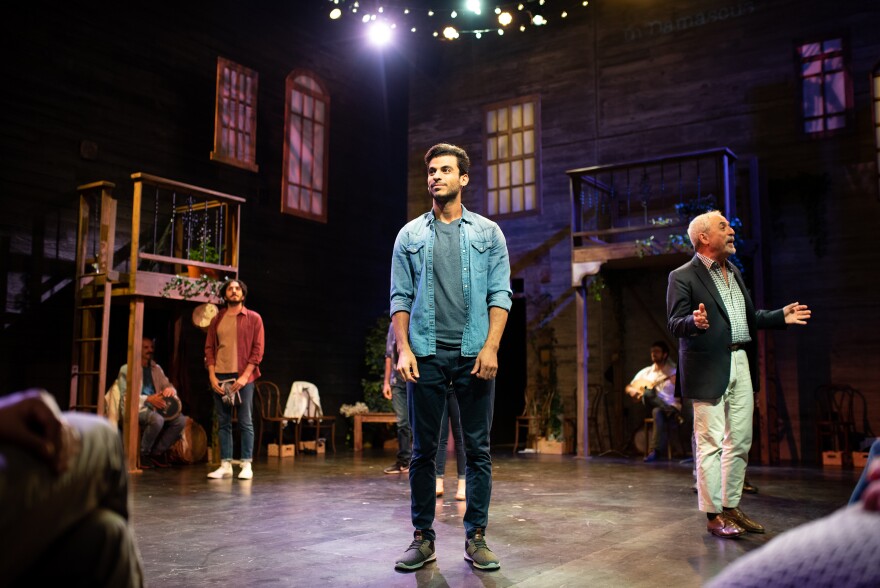 Mohamad Alrefai performs on stage in the play <em>10,000 Balconies</em> at TheatreSquared in Fayetteville, Ark., on Friday.