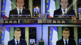 TV screens show French President Emmanuel during a televised address to the nation, at an electrical appliance store in Marseille, southern France, Monday, Dec. 10, 2018. President Emmanuel Macron has acknowledged he's partially responsible for the anger that has fueled weeks of protests in France, an unusual admission for the leader elected last year. (Claude Paris/AP)