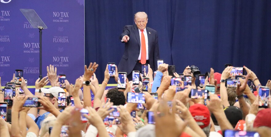 President Donald Trump spoke to a cheering crowd at The Villages High School gym in Middleton in The Villages on Friday.