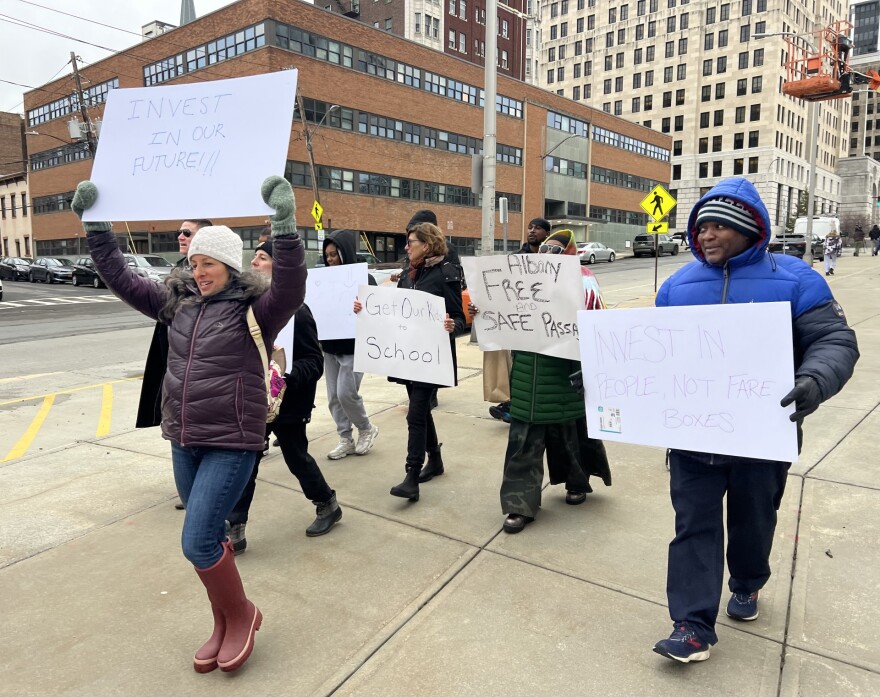 Students and local advocates walk from the New York State Capitol to Green Tech Charter School demanding accessible bus routes to school.