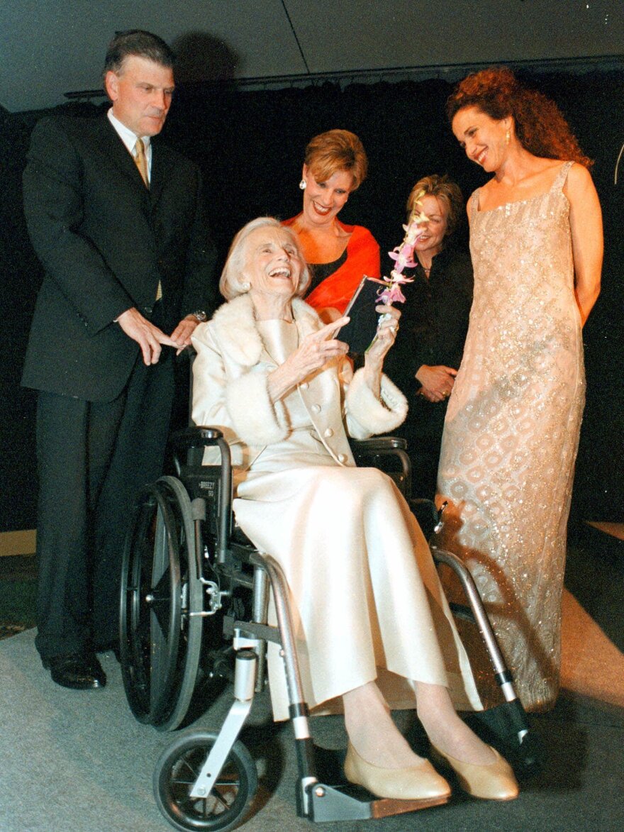 Ruth Bell Graham, seated, laughs as her son, the Rev. Franklin Graham (from left), daughter Gigi Graham Tchvidijian, novelist Patricia Cornwell and actress Andie MacDowell celebrate Graham's 80th birthday in Asheville, N.C., on May 30, 2000.