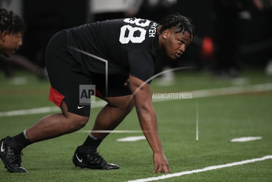 Georgia defensive lineman Jalen Carter runs football drills during Georgia's Pro Day, Wednesday, March 15, 2023, in Athens, Ga. (AP Photo/John Bazemore)