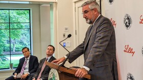 Gov. Eric Holcomb asks people gathered at an announcement by Eli Lilly to take a moment to offer thoughts and prayers to the families affected in Texas by the Uvalde school shooting.