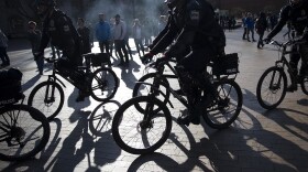 Police officers form a line on Saturday, Feb. 10, 2018, outside of a College Republicans rally at Red Square on the University of Washington campus in Seattle.
