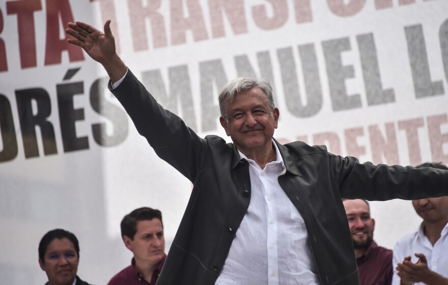 Mexican President-elect Andrés Manuel López Obrador waves to supporters during his national tour to thank those who voted for him in the July 1 elections, at the Plaza de las Tres Culturas in Mexico City, in late September.