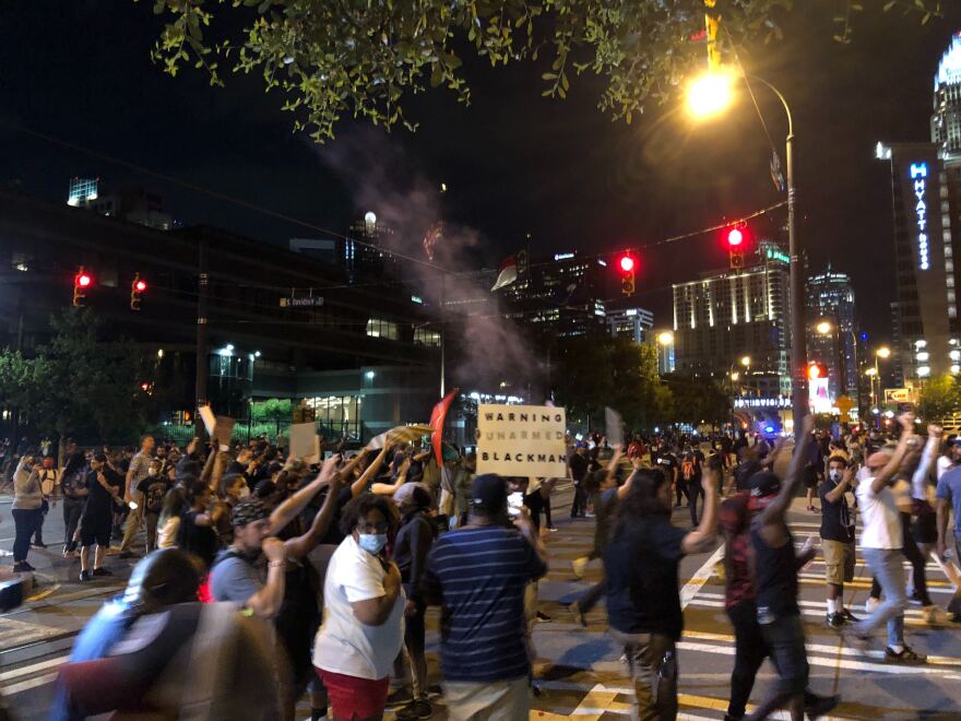 Protesters demonstrate near the Charlotte-Mecklenburg Police Department headquarters on May 30, 2020.