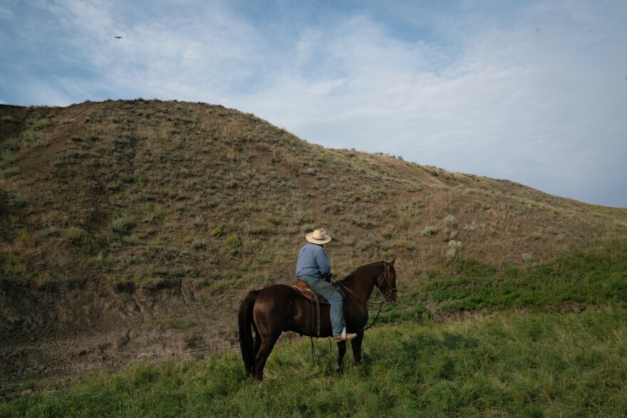 Craig French rides a horse on his ranchland. While some ranchers in this pocket of the Great Plains overgrazed their spreads and plowed up native grasses, most did a good job taking care of it.