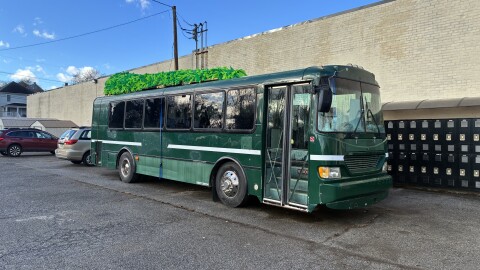 A warming bus operated by The Least of These Ministry, decorated for the Roanoke Christmas parade.