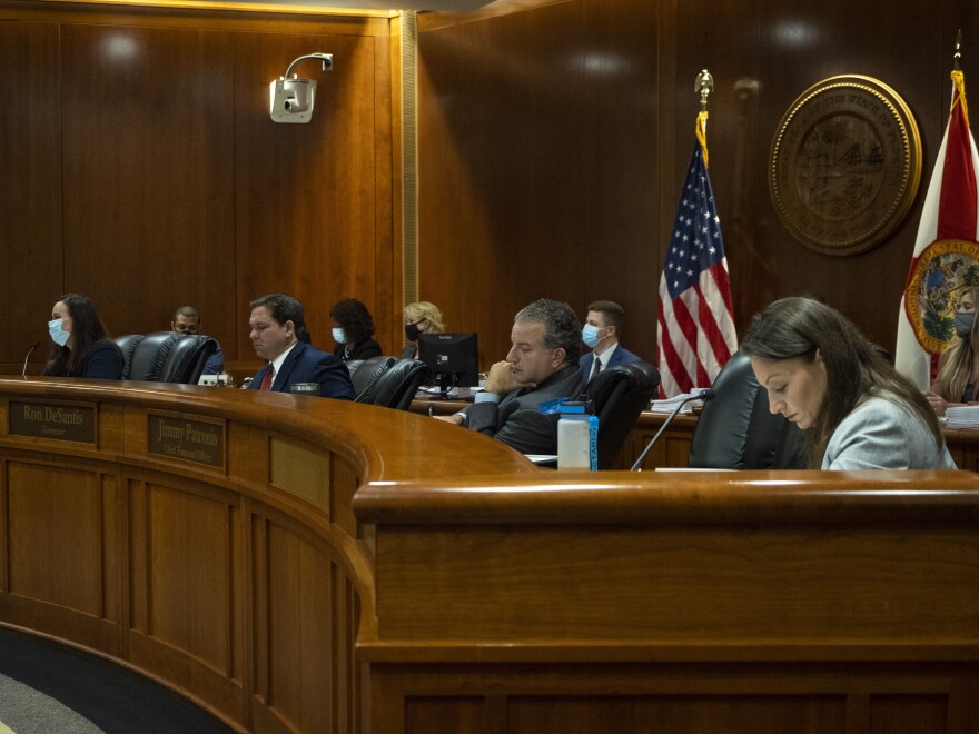 The Clemency Board members, Ashley Moody, Ron DeSantis, Jimmy Patronis and Nikki Fried are seen at the Tallahassee Capitol building on Wednesday, Sept. 23, 2020. Even though this hearing usually happens quarterly, this was the first Clemency Hearing this year. (Emily Felts/Fresh Take Florida)