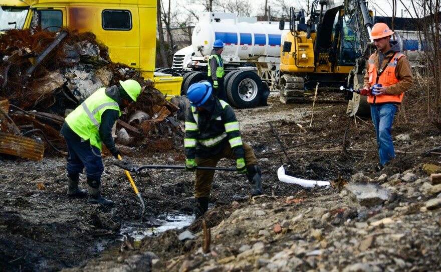 Workers at the UPS crash site are still directing oil slick through ditches and into pumps more than two months after the plane hit a petroleum recycling center.