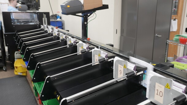 FILE - Vote-by-mail envelopes are sorted at the Shasta County Registrar of Voters office in Redding, Calif., Tuesday, Feb. 20, 2024.