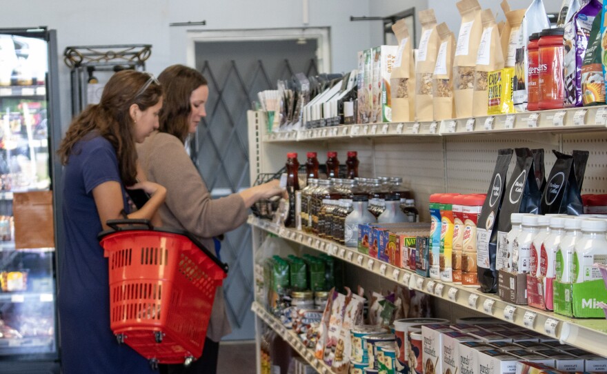 Stacey Castro and her daughter browse items at Jayce's Grocery Store on Tuesday, April 7. The store opened in China Spring in March and carries a variety of local vendors.