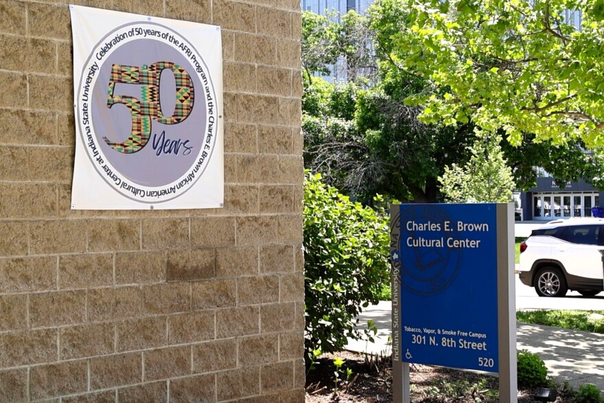 A blue sign at Indiana State University says "The Charles B. Cultural Center."