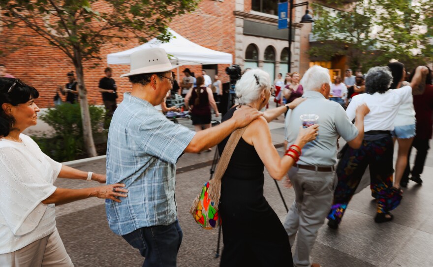 Los Electro's David Vaides leads a conga line on The Landing