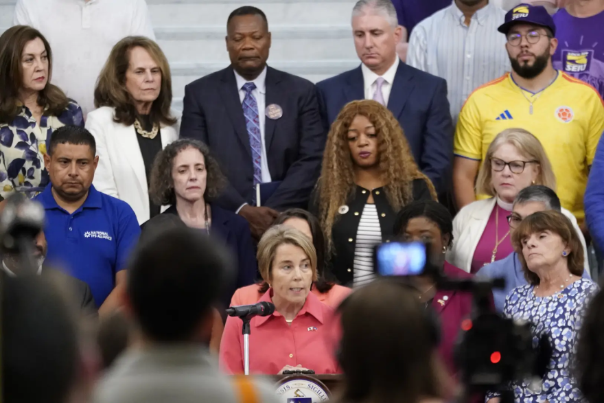 Gov. Maura Healey speaks at a press conference discussing the loss of Temporary Protected Status for Haitian and Syrian immigrants on Thursday, June 25 at the Massachusetts State House in Boston.