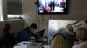 Furr High School is experimenting with a new model for high school, including how they hire teachers. Here, administrators watched applicants on a live video feed as they tried to solve clues and “escape the room” during the interview process. (Laura Isensee/Houston Public Media)