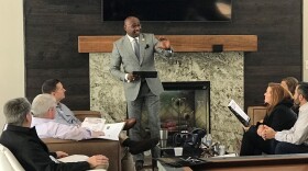Dr. Karockas Watkins of the Huntsville/Madison Chamber of Commerce talks with the local board and staff of BancorpSouth in Hunstville, Alabama in 2020.