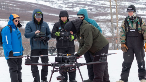 Alaska’s Department of Transportation avalanche mitigation team prepares a drone from Drone Amplified for deployment in the backcountry.