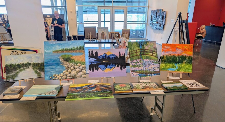 Some of the locally produced art displayed at the Clock Inc. art auction fundraiser June 25, 2026 at the Figge Art Museum, Davenport.