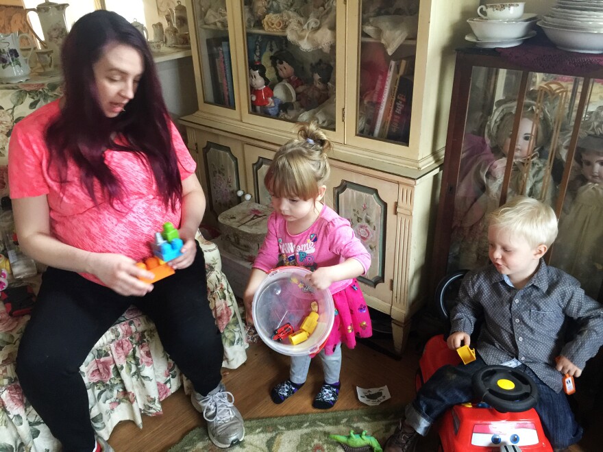 Andria Smith (left) with her daughter Delilah Smith (center) and Jenna Sauter's son, Maverick Hawkins, in Nevada City, Calif. The mothers are both members of the Facebook group "Pot Smoking Moms Who Cuss Sometimes."