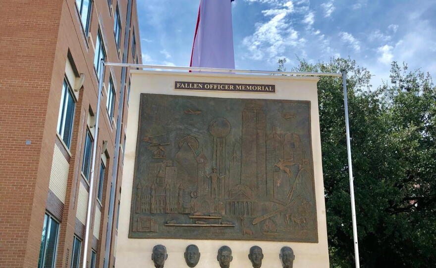 After a solemn ceremony on Monday, Dallas city and police officials unveiled a sculpture honoring five police officers killed in a sniper attack in downtown Dallas three years ago.
