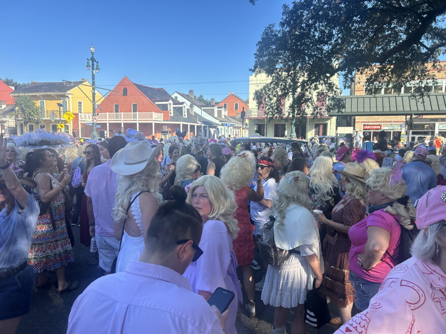 The crowd prepares to march down St. Ann St.