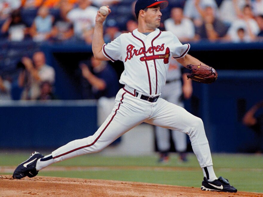 Atlanta Braves starting pitcher Greg Maddux delivers to a Baltimore Orioles batter at Turner Field in Atlanta in 1999.